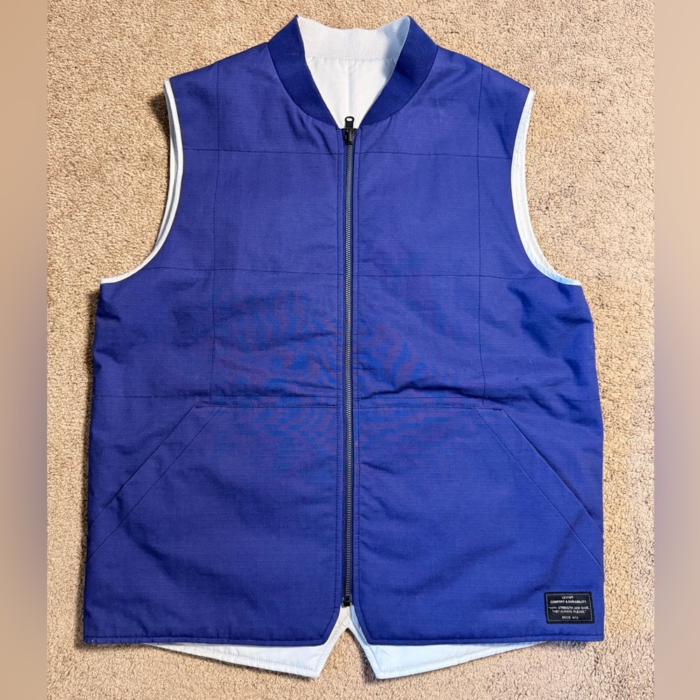 Levi’s Navy and Grey reversible vest and the blue Large